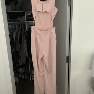 Beautiful cream/pink jumpsuit with side cut out.